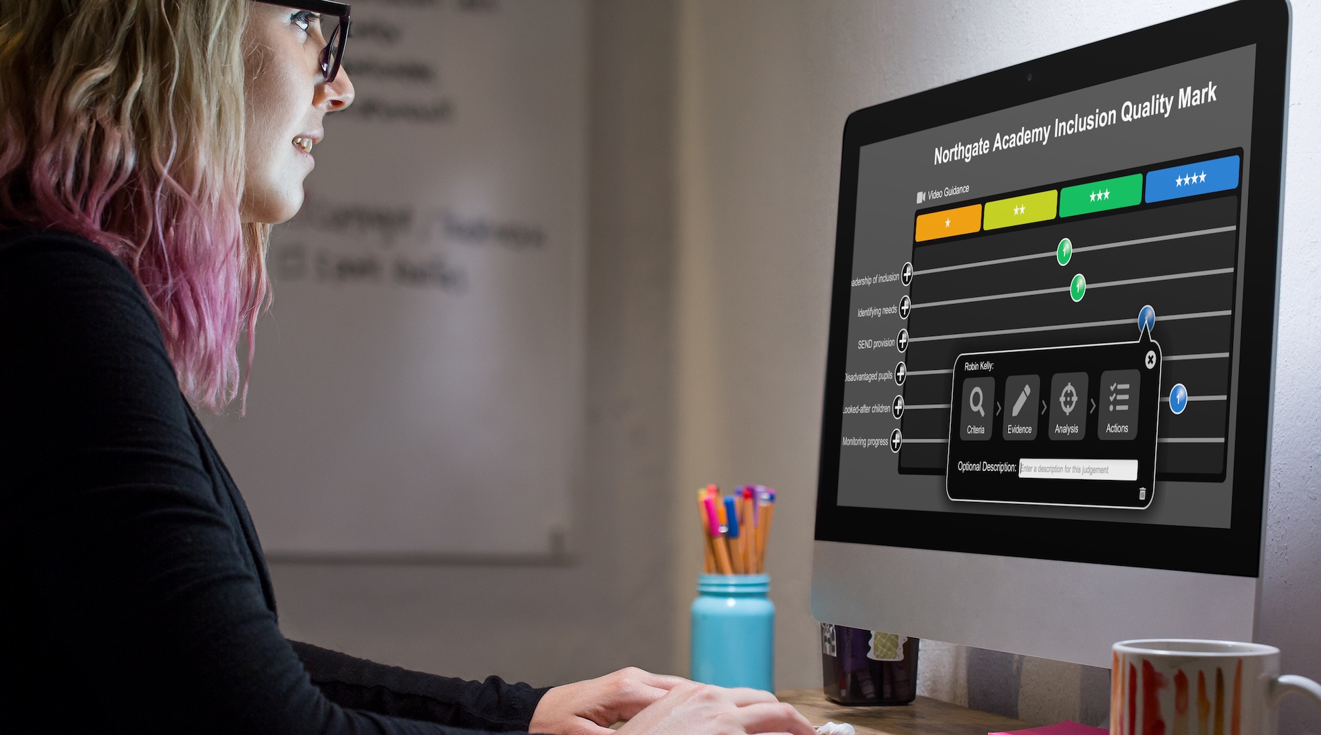 School leader using iAbacus to complete a Northgate Academy Inclusion Quality Mark evaluation on screen